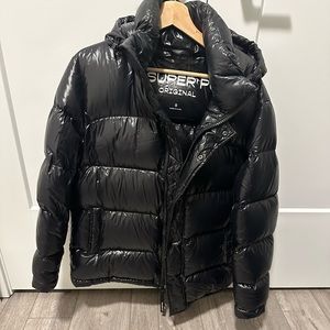 Aritzia Women’s Super Puff. Colour is high gloss black and size small.